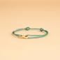 Preview: 1,5 mm grünes Nylonarmband mit einem Titan-Unendlichkeitszeichen - Infinity Green Gold